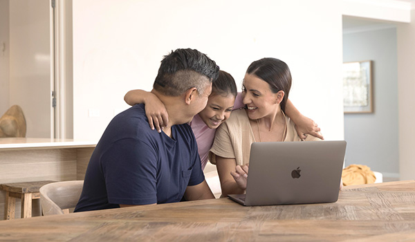 Family using laptop 